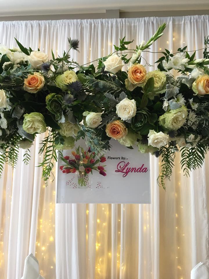 Flowers By Lynda roses arch