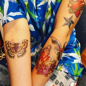 Shimmer Squad arm tattoos