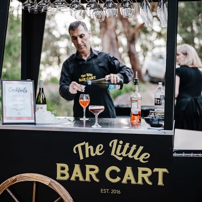 The Little Bar Cart pouring drinks