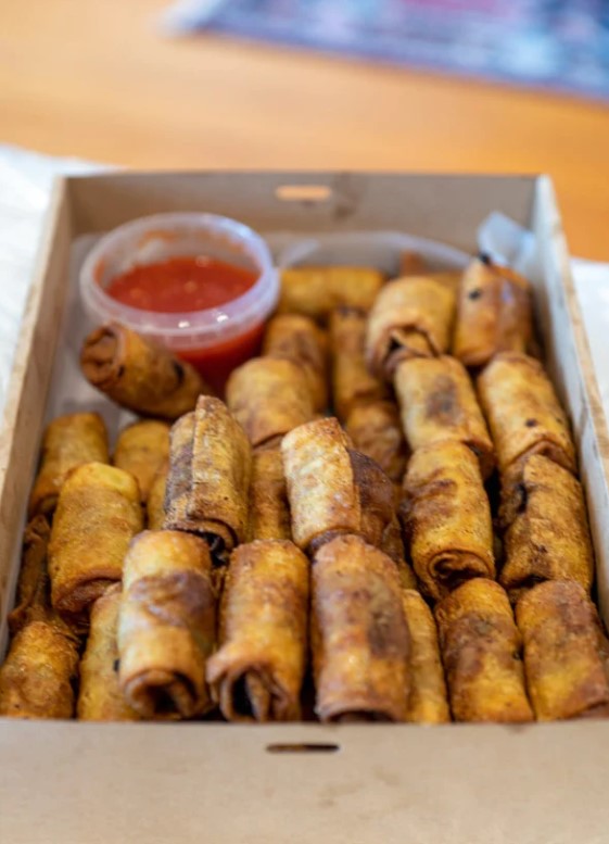 https://projectparty.com.au/wp-content/uploads/2020/10/rimon-catering-spring-rolls.jpg