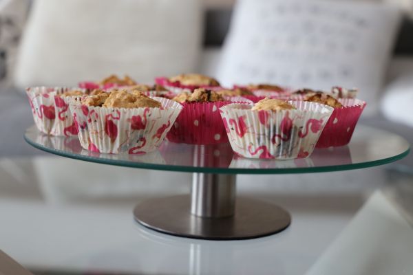 A plate of cupcakes in a Flamingo-themed wrappers