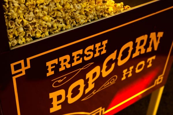 A close-up view of the side of a popcorn machine