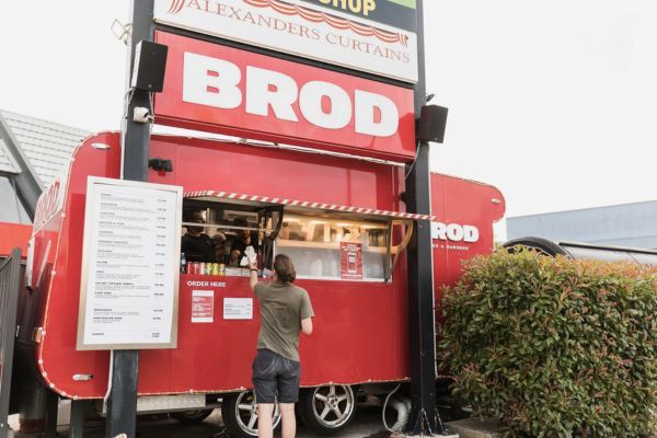 Brodburger truck serving a customer