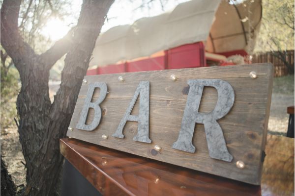 A bar sign for an outdoor wedding in Sydney
