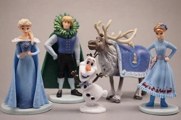 Multiple Frozen figurines cake toppers.