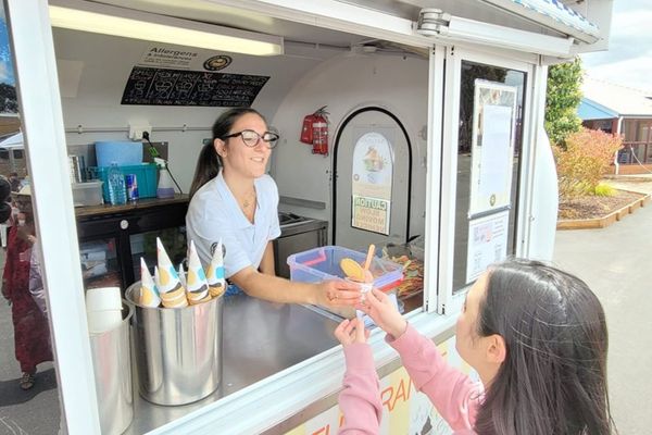 A customer being served at the Naturalis Gelato Italiano truck