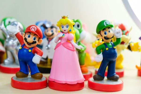 A collection of Super Mario character figurines